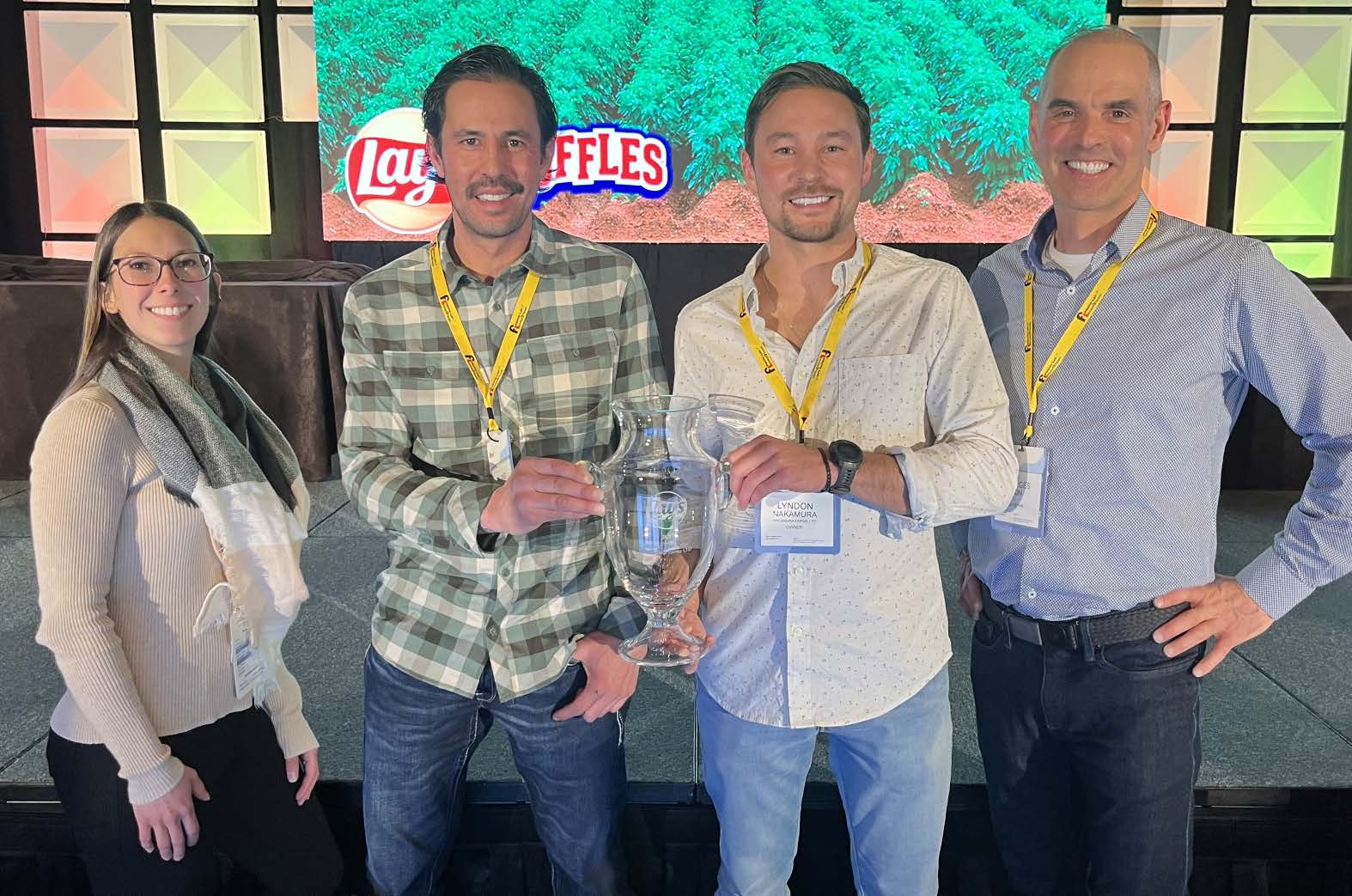 Nakamura Farms’ agronomist Paige Fletcher, Ryland and Lyndon Nakamura and Georges Dion from Frito Lay Canada, at the recent 2024 Potato Expo in Austin, TX.